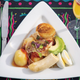 Triangular plate piled with Bermudian codfish breakfast